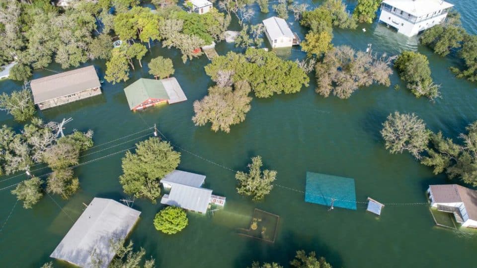 flooded town; loss and damage compensation for climate change