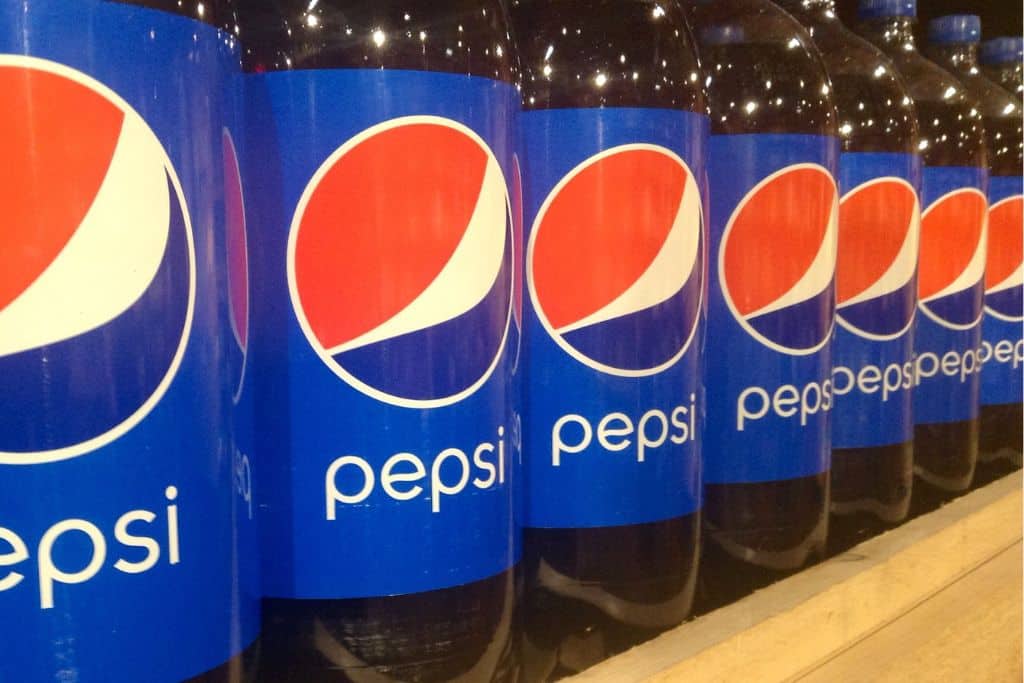 Pepsi plastic bottles; plastic packaging waste; plastic pollution; beverage single-use plastic bottles in landfill. Photo: Flickr/Mike Mozart