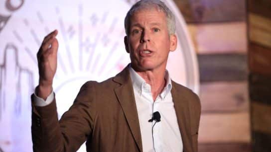 Chris Wright speaking with attendees at the American Conservation Coalition's 2023 Summit at the Salt Lake City Marriott City Center in Salt Lake City, Utah.