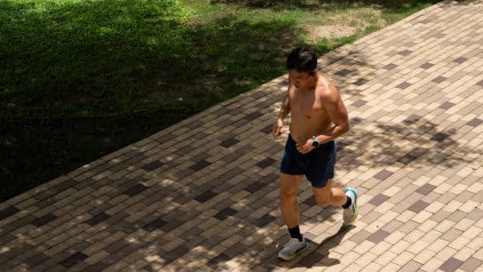 A runner sweating in Hong Kong's heat.