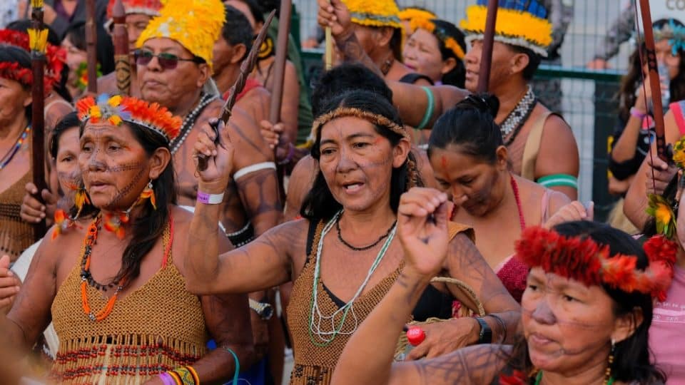 Munduruku indigenous people hold a demonstration at COP30.
