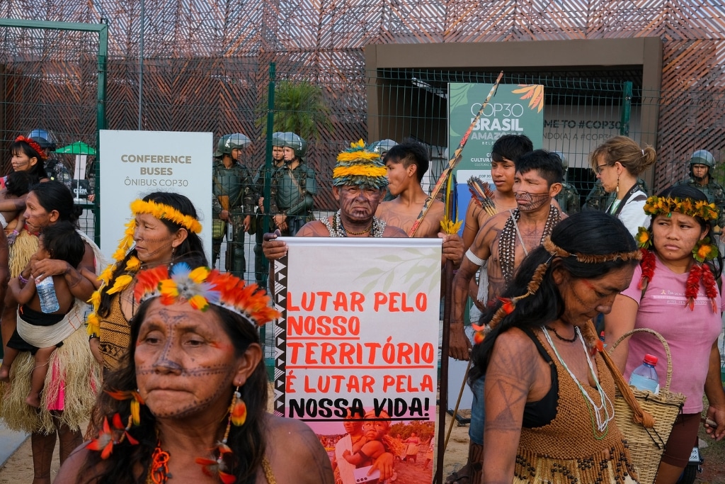Munduruku indigenous people hold a demonstration at COP30.