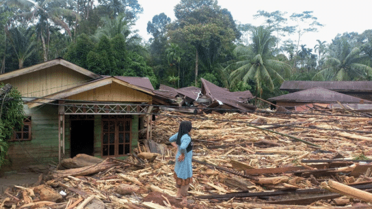 These photos, taken on November 28, show the aftermath of deadly floods in Aceh, an Indonesian province on the northwest tip of Sumatra Island.⁠