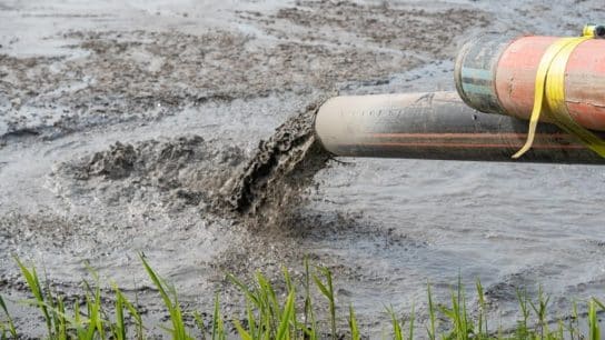 Dredging of contaminated sediments takes place at Otter Creek, Ohio in 2021.
