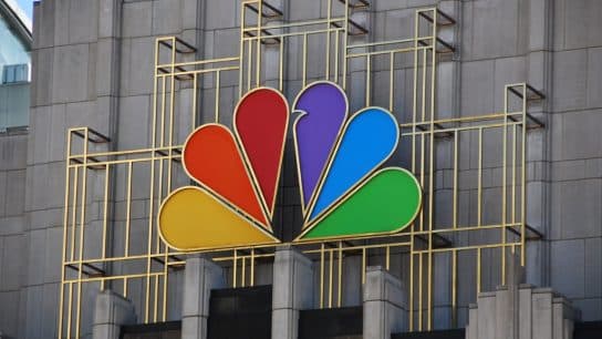 Logo of commercial broadcast network NBC on the NBC Tower in Chicago, US.