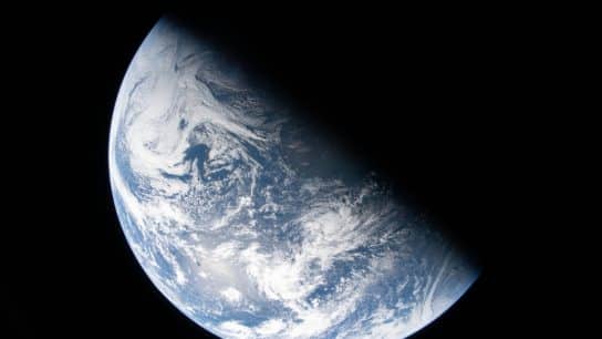 A view of Earth taken by NASA astronaut and Artemis II Commander Reid Wiseman from one of the Orion spacecraft's four windows after completing the translunar injection burn on April 2, 2026.
